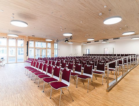 Image of a large room with rows of chairs