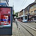 The UW/H campaign can be seen on a poster at an S-Bahn stop.