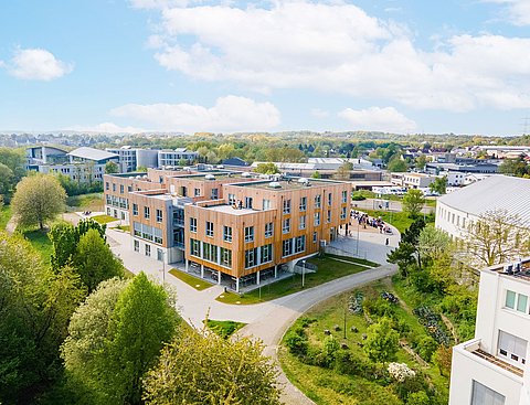 Drone image of the wooden building of the UW/H