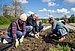 Three people from UW/H working in the field.