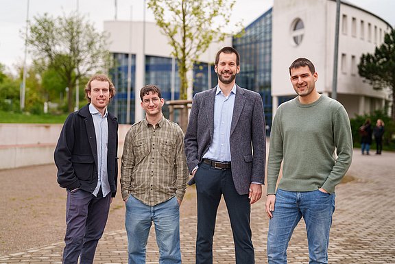 Group photo of four people