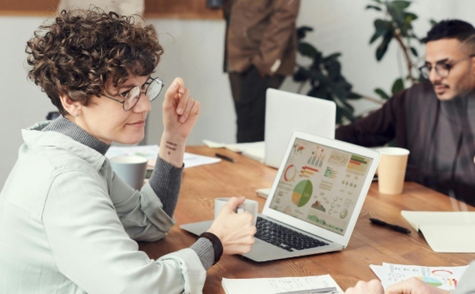 Three people in a meeting